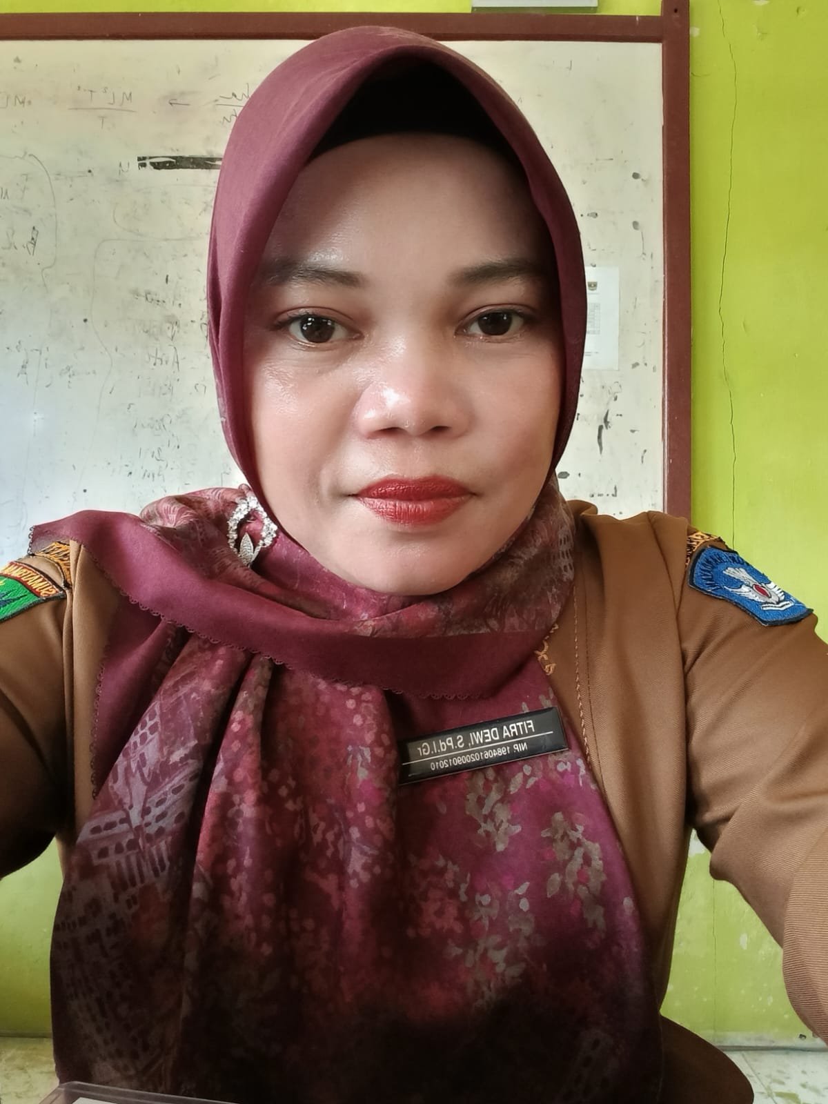 Fitra Dewi, S.Pd.I.,Gr